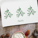 Personalized Mistletoe Kitchen Towel<br><div class="desc">This Christmas kitchen towel is decorated with watercolor mistletoe foliage and berries.
Easily customizable with your name or monogram.
Use the Design Tool to change the text size, style, or colour.
As we create our artwork you won't find this exact image from other designers.
Original Watercolor © Michele Davies.</div>