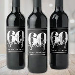 Personalized Modern Black 60th Birthday Party Wine Label<br><div class="desc">Introducing a simple and modern 60th birthday wine bottle label, perfect for celebrating this milestone in style. The design features a bold black background with a prominent "60" and "Sixty" displayed in the centre as the main focal point. Just underneath, the birthday person’s name and age are showcased again for...</div>