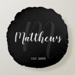 Personalized Modern Script Monogram & Family Name Round Pillow<br><div class="desc">Personalized Monogram and Family Name Gift featuring family name in white modern script font style and monogram in grey modern script font style as background with established year in white sans serif font style on black background. Perfect as gift for newlyweds, holiday gift for family, family reunion favours and gift...</div>