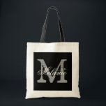 Personalized monogram tote bag | black and white<br><div class="desc">Personalized name monogram tote bag | black and white colour. Elegant logo design with beautiful monogrammed letter initials.  Cute vintage gift idea for bride,  flower girls,  maid of honour and bridesmaids at weddings. Classy script text with chic background letter. Also great for bridal shower or bachelorette party.</div>