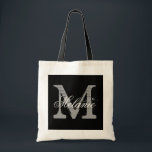 Personalized monogram tote bag | black and white<br><div class="desc">Personalized name monogram tote bag | black and white colour. Elegant logo design with beautiful monogrammed letter initials.  Cute vintage gift idea for bride,  flower girls,  maid of honour and bridesmaids at weddings. Classy script text with chic background letter. Also great for bridal shower or bachelorette party.</div>