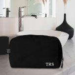 Personalized Monogrammed Groomsmen Gift Black Dopp Kit<br><div class="desc">Surprise your groomsmen with a thoughtful and stylish gift they'll love - our Personalized Monogrammed Black Dopp Kit! Perfect for storing all their grooming essentials,  this sleek kit can be customized with their initials for a special touch.</div>