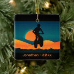 Personalized Mountain Bike Sunset Christmas Ceramic Ornament<br><div class="desc">This Mountain Bike Christmas Tree Ornament features a silhouette mountain biker with the sun setting behind a mountain range.  -  It can be personalized with a name,  year or any text that you wish to add.  Thanks for stopping by!</div>