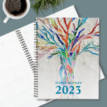 Personalized Name 2023 Planner<br><div class="desc">This unique Planner is decorated with a brightly coloured mosaic tree on a pale grey background. Customize it with your name and year. To edit further use the Design Tool to change the font, font size, or colour. Because we create our artwork you won't find this exact image from other...</div>
