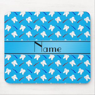 Personalized name blue brushes and tooth pattern mouse pad
