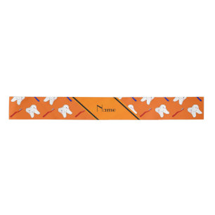 Personalized name orange brushes and tooth pattern satin ribbon