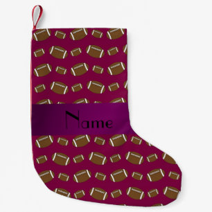 Personalized name plum purple footballs small christmas stocking