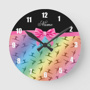 Personalized name rainbow gymnastics pink bow round clock