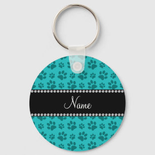Personalized name turquoise dog paw prints keychain