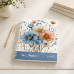 Personalized Name & Year Blue Wildflower Planner<br><div class="desc">Stay organized in beautiful style with this personalized blue wildflower planner, designed with soft watercolor florals and customized with your name and year on the cover. This elegant planner blends botanical charm with everyday practicality, making it perfect for work, school, or personal planning. The calming blue floral design gives it...</div>
