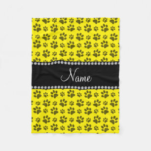 Personalized name yellow dog paw print fleece blanket