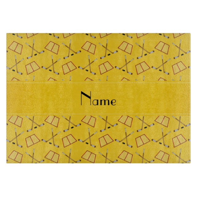 Personalized name yellow hockey pattern cutting board (Front)