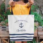 Personalized Nautical "Bridesmate" Bridesmaid Tote Bag<br><div class="desc">Cute nautical themed tote for your bridesmaids in classic navy blue and white features a ship's anchor illustration with "bridesmate" curved over the top. Personalize with each bridesmaid's name in navy brush script lettering. A trio of navy blue stripes along the bottom completes the look. Gift one to each member...</div>