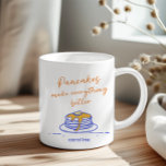 Personalized Pancake Lovers Mug Fun Breakfast Art<br><div class="desc">Start your day with a smile with this personalized pancake-themed mug, perfect for breakfast enthusiasts and brunch lovers. Featuring a charming hand-drawn stack of pancakes dripping with syrup and paired with warm orange and vibrant blue hues, this design is both playful and stylish. Ideal for coffee, tea, or hot chocolate,...</div>