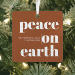 Personalized Peace On Earth Christmas Modern Photo Metal Ornament<br><div class="desc">Introducing our "Terracotta Personalized Peace On Earth Christmas Modern Photo Metal Ornament, " a warm and meaningful addition to your holiday decor. This finely crafted metal ornament showcases a rich terracotta colour, embodying the earthy warmth of the season. The classic message of "Peace On Earth" is elegantly displayed, reminding us...</div>