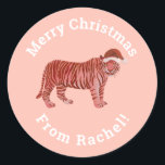 Personalized Pink Merry Christmas Santa Tiger Classic Round Sticker<br><div class="desc">This cute personalized pink Merry Christmas Santa Tiger classic round sticker will give your gifts a personal touch easily. You can edit the text if you click on the customize button and change the font style, colour and text. Your presents will have a unique personal touch with this pink Santa...</div>