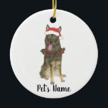 Personalized Sable German Shepherd Christmas Ceramic Ornament<br><div class="desc">Make the nice list this year with a personalized Christmas ornament of your favorite little sable german shepherd elf in a santa hat and red and green holly wreath! For the sweetest gifts, pair it with a matching art print or another item from my sable german shepherd collection!</div>