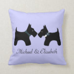 Personalized Scottie Dogs Couple (Reversible) Throw Pillow<br><div class="desc">This adorable couple of black Scottish Terriers -- or Scotties -- can be customized with his and her names for a cute gift for a couple. Features a boy and girl Scottie dog, he with a Scottish tartan bow tie and she with a flower on a white collar. The background...</div>