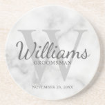 Personalized Script Groomsmen's name and Monogram  Coaster<br><div class="desc">Add a personal touch to your wedding with personalized groomsmen coaster. This coaster features personalized groomsman's name in grey classic script font style with wedding details in grey classic serif font style and monogram in light grey classic serif font style as background, on white marble background. Also perfect for best...</div>