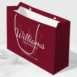 Personalized Script Groomsmen's name and Monogram  Large Gift Bag<br><div class="desc">Add a personal touch to your wedding with personalized groomsmen gift bag. This gift bag features personalized groomsman's name in white classic script font style with wedding details in white classic serif font style and monogram in light burgundy red classic serif font style as background, on burgundy red background. Also...</div>