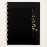 Personalized Stylish Signature Black Gold Planner<br><div class="desc">Personalize this elegant modern design with your name in vertical gold-coloured signature handwriting script on a black background. (To keep the swashes at the beginning and end of the name,  replace only the letters,  leaving the symbols in place.)</div>
