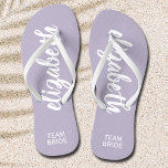 Personalized Team Bride Periwinkle and White Flip Flops<br><div class="desc">Periwinkle and white - or any colour - flip flops personalized with your name and "Team Bride" or any wording you choose. Great bridesmaid gift, bachelorette party, flat shoes for the wedding reception, or a fun bridal shower favour. Change the colour straps and footbed, too! More colours done for you...</div>