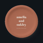 Personalized Terracotta Rust Fall Retro Wedding Paper Plate<br><div class="desc">Celebrate your big day with style using this modern terracotta wedding paper plate featuring bold,  minimalist typography and a warm earthy tone. Personalized with names and date,  it’s a perfect touch for rustic,  boho,  or outdoor receptions,  rehearsal dinners,  or engagement parties. A chic and practical choice for casual elegance.</div>