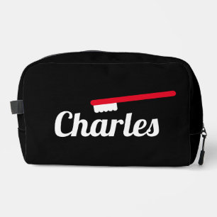 Personalized toiletry bag with red toothbrush logo