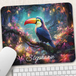 Personalized Toucan Paradise Mouse Pad<br><div class="desc">Escape to a tropical paradise with this personalized mouse pad featuring a vibrant toucan amidst lush jungle foliage. The colourful design and intricate details transport you to an exotic world, inspiring creativity and joy. Add a personal touch with your name or a favourite quote. The smooth surface ensures precise mouse...</div>