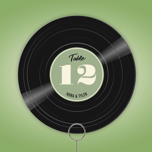 Personalized Vinyl Record Sage Green Table Number (Round personalized vinyl record table number with sage green label.)