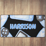 Personalized Watercolor Blue Gaming Desk Mat<br><div class="desc">Introducing our latest must-have kids gaming accessory - the blue themed custom Desk Top Mat! Designed has a black background, with watercolor blue controllers, consoles and is personalized with their name in a fun bubble font. This mat features anti-slip backing to prevent slipping and sliding whilst also protecting surfaces. provides...</div>