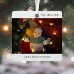 Personalized With Photo Baby's First Christmas Metal Ornament<br><div class="desc">Celebrate your little one's very first holiday season with the Personalized With Photo Baby's First Christmas Metal Ornament. This shatterproof metal ornament is the perfect keepsake to honour your baby's first Christmas, featuring two cherished family photos that will warm your heart year after year. With its sleek design and personalized...</div>