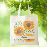 Personalized Yellow Sunflowers Foliage  Tote Bag<br><div class="desc">This unique tote bag is decorated with a watercolor sunflower and foliage pattern in shades of yellow and green.
Easily customizable.
Because we create our artwork you won't find this exact image from other designers.
Original Watercolor © Michele Davies.</div>