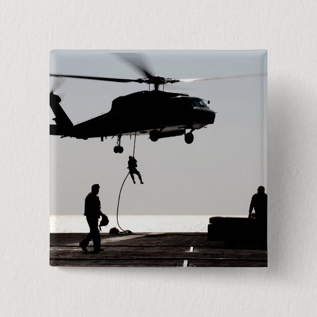 Personnel fast-rope out of an SH-60F 2 Inch Square Button (Front)