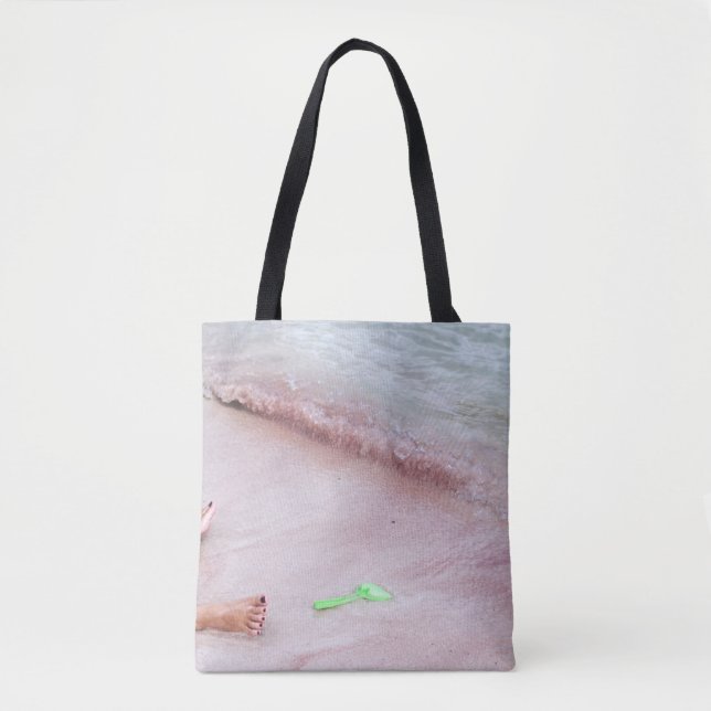 Person's foot beside green shovel on seashore tote bag (Front)