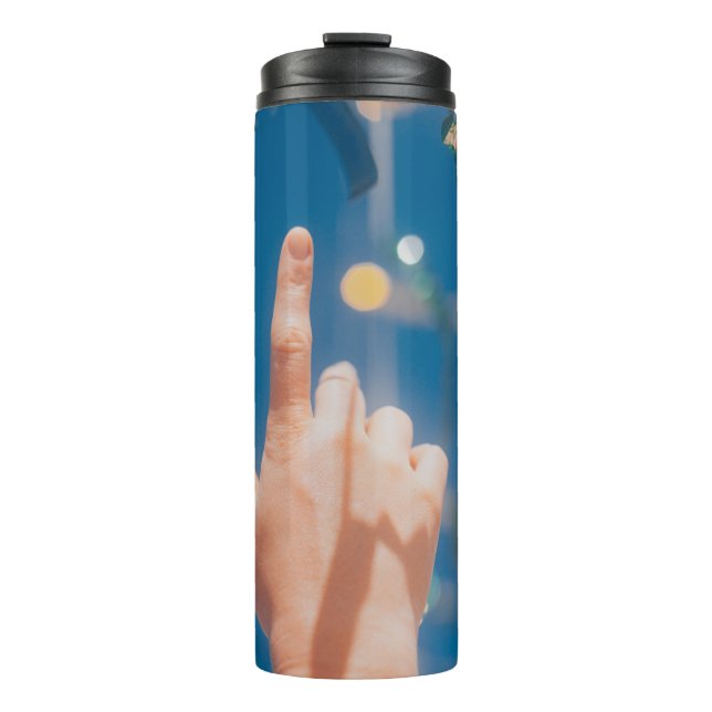 Persons hand with blue light thermal tumbler (Front)