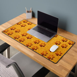 Pet paw dark gold glitter print on gold background desk mat