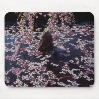 Petals floating on fish pond mouse pad