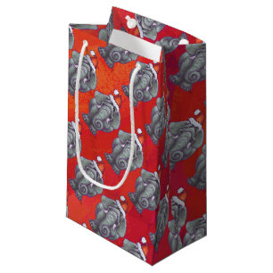 Petit Sac Cadeau Noël d'éléphant sur le rouge