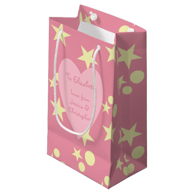 Petit Sac Cadeau Noël rose et jaune avec étoiles et neige (Devant Angle)