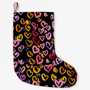 Petite Chaussette De Noël Aquarelle motif transparent avec les coeurs.