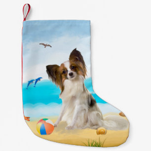 Petite Chaussette De Noël Chien de Papillon sur la plage