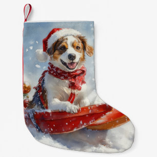 Petite Chaussette De Noël Épagneul breton dans un traîneau de Noël