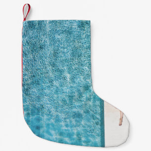 Petite Chaussette De Noël Femme en noir bikini fond et blanc soleil casquett