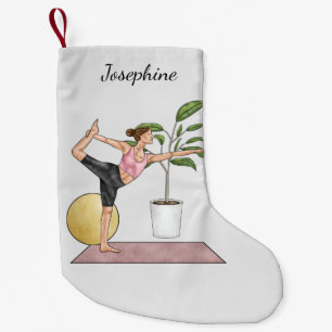 Petite Chaussette De Noël Femme faisant du yoga en posture de danseuse pour