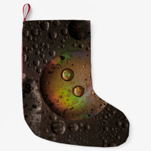 Petite Chaussette De Noël gouttelettes d'eau sur panneau de verre