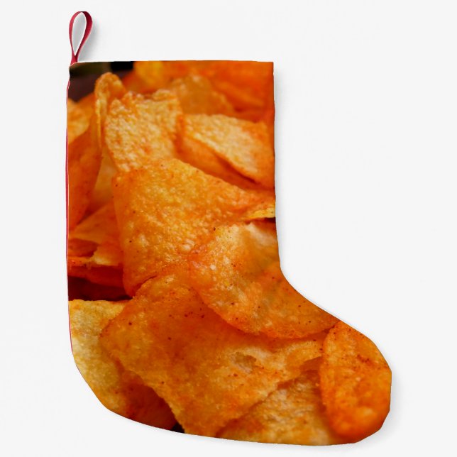 Petite Chaussette De Noël Gros plan de chips juteux, croustillants sur plaqu (Devant)