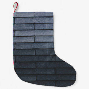 Petite Chaussette De Noël Gros plan du mur en briques grises
