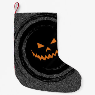 Petite Chaussette De Noël Halloween Jack rougeoyant O'Lantern dans un remous