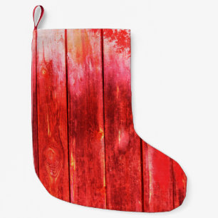 Petite Chaussette De Noël Lumineuse texture de la planche murale en bois rou